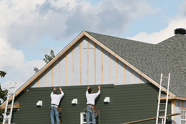 Professional Siding Contractor technician working in Great River, NY